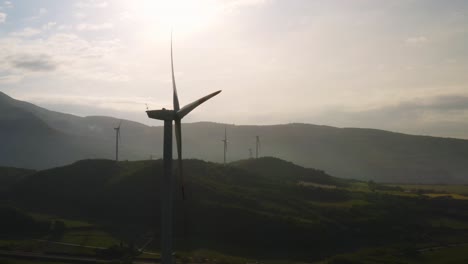 eolic wind turbines spinning and producing sustainable clean energy