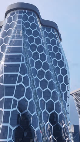 modern skyscraper with hexagon pattern facade