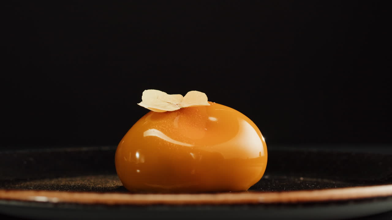 Cutting a Beautiful Orange Dessert