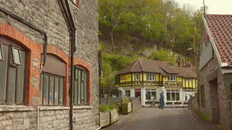 profile view of ancient architecture houses at cheddar town in uk during daytime. old streets.