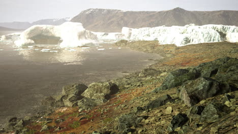 Blue-icebergs-of-Antarctica-with-frozen-and-snow-covered-Antarctic-scenery