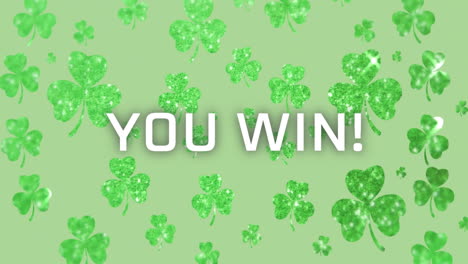 you win! text over animation of green glittering shamrocks on light green background