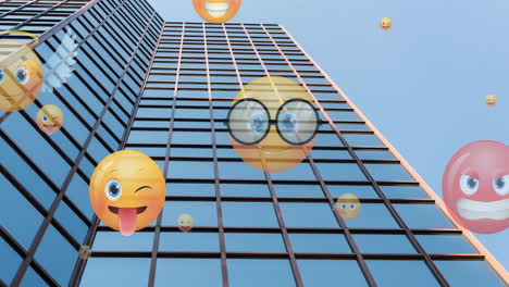 animation of emoji icons flying up over modern office building against blue sky