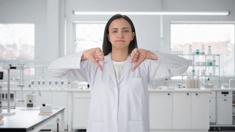 Upset-Indian-female-scientist-showing-thumbs-down