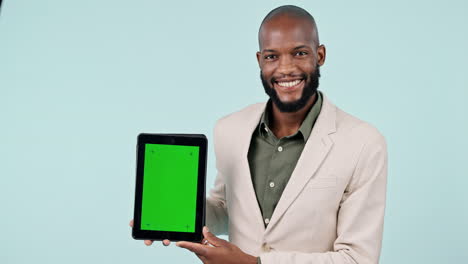african man, tablet and green screen for business