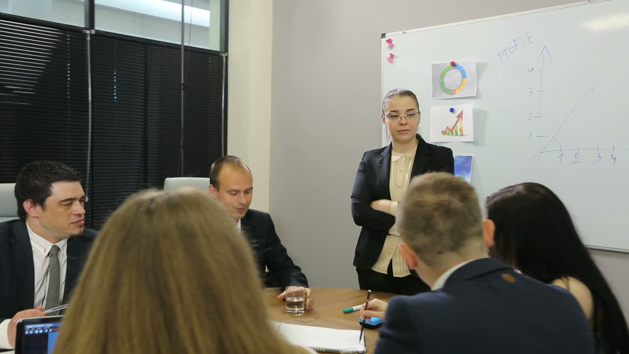 Business Team Plan Work In Office. Group of confident business partners planning work at meeting