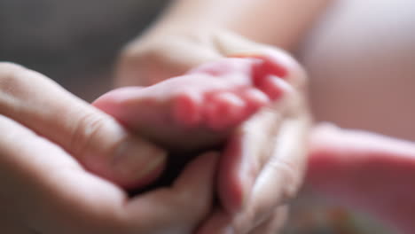 Massaging-baby-feet