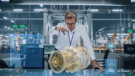 высокотехнологичная промышленность: инженер, проектирующий 3d-двигатель, использующий таблицу голограмм дополненной реальности для анализа прототипа модели. турбина для производства зеленой энергии электроэнергии. автоматизированное производство робототехники