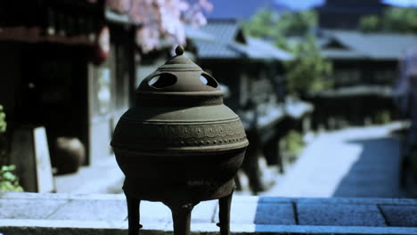 antique incense burner in a traditional asian village