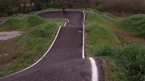 Eboarding-footage-around-a-BMX-pump-track