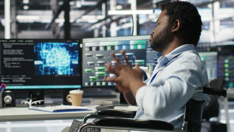 engineer using wheelchair in data center using ai node tree software