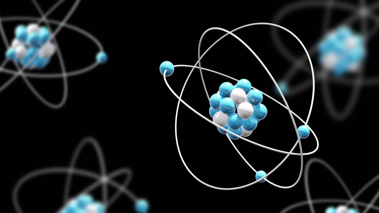 Animation of atom models spinning on black background