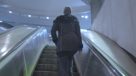 people on escalator