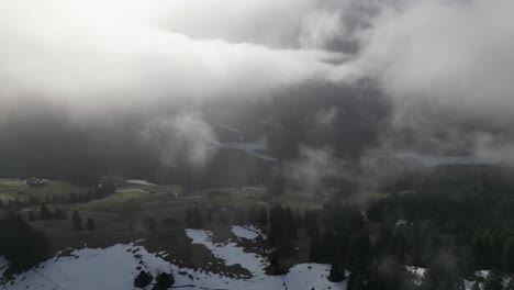 obersee glarus näfels switzerland swiss villages as seen through the clouds on mountainside