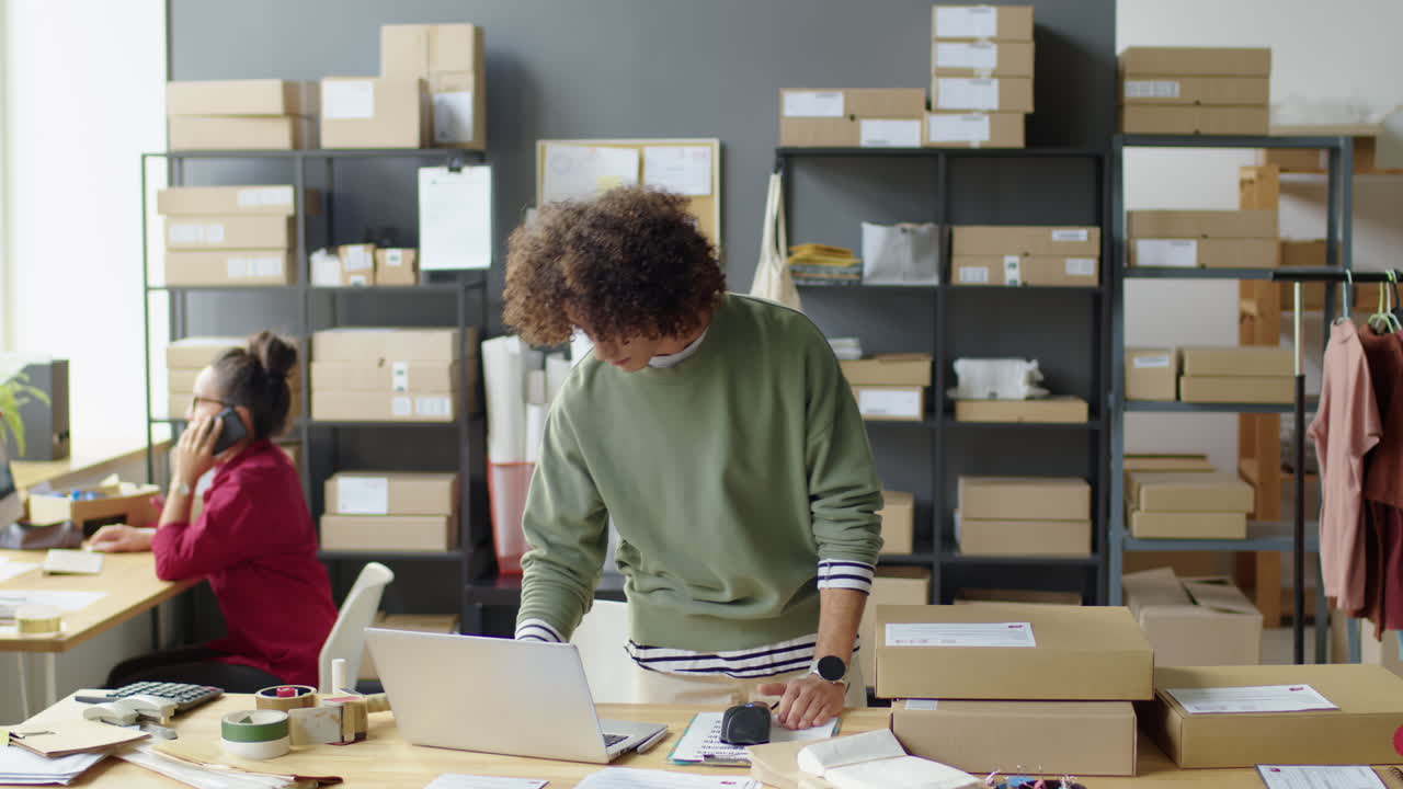 Office with boxes and laptop