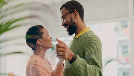 African-couple,-dancing-and-smile-in-home