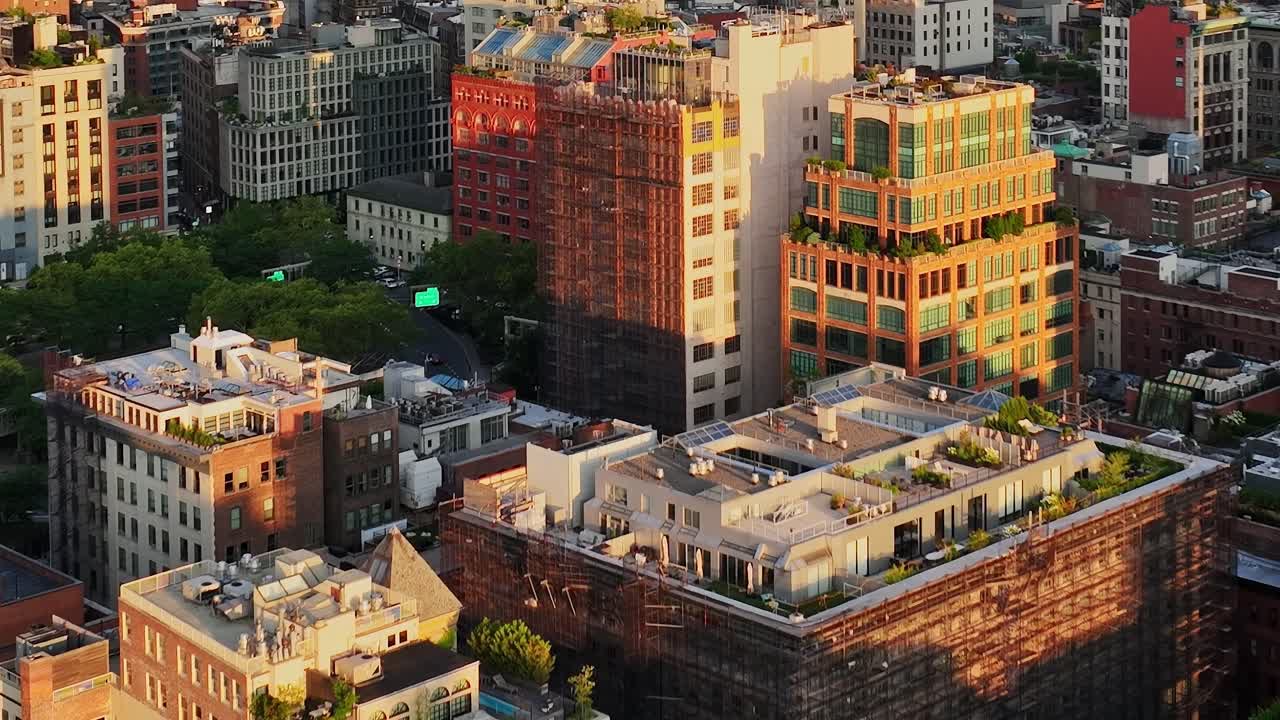 Aerial view of urban buildings in New York during sunset