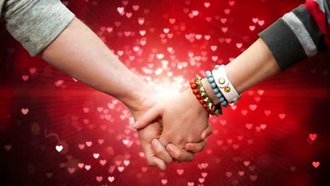pareja tomados de la mano