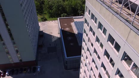 Aerial-drone-view-of-Faculty-of-Humanities-Charles-University-campus-in-Prague,-Czech-Republic,-creative-descending-view