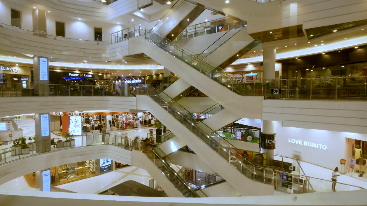 Modern Shopping Mall Interior with Escalators