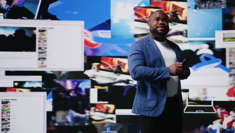young social media expert connecting on social network for trends on dashboard
