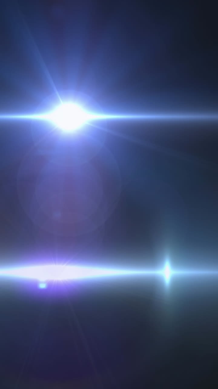 animación del foco con destello de la lente y haces de luz que se mueven sobre un fondo oscuro