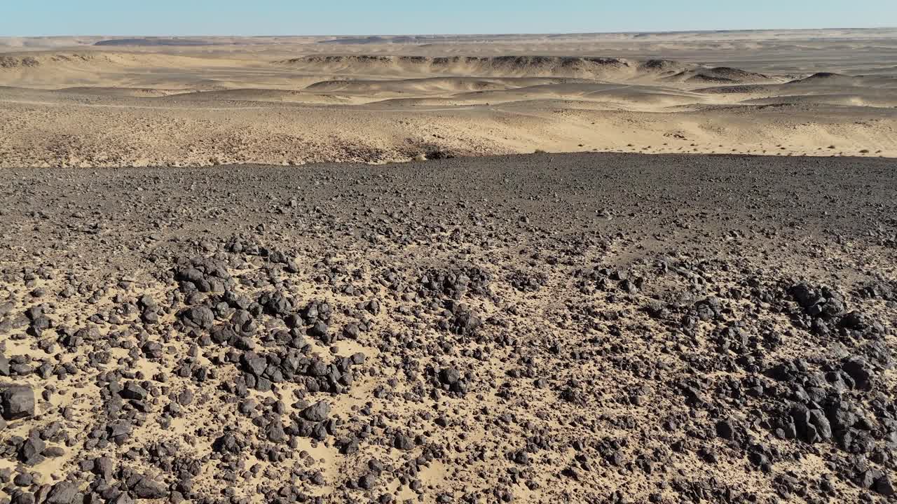 Aerial drone view of the Eye of the Sahara, Richat Structure in Mauritania. Unique circular geological formation in the desert landscape of the Sahara