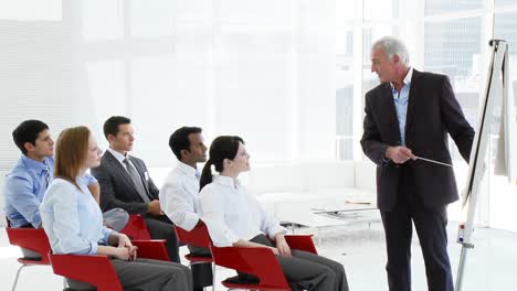 business people applauding their manager