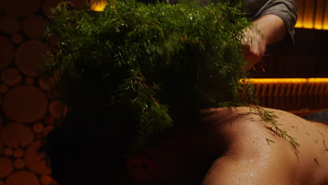 juniper back massage in a sauna