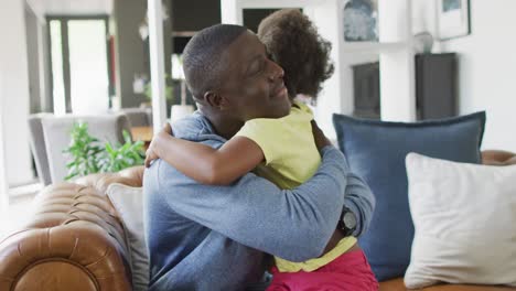 Video-of-african-american-father-and-daughter-talking-and-playing