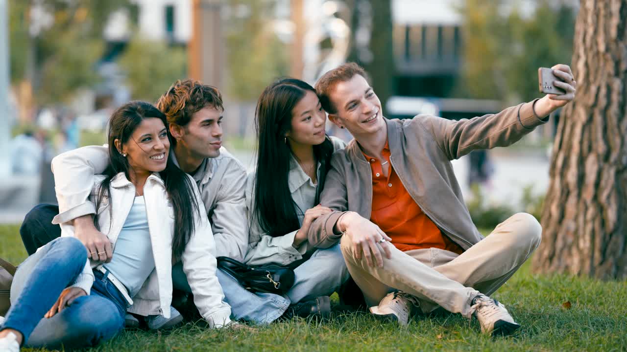 Group of friends taking a selfie in the park