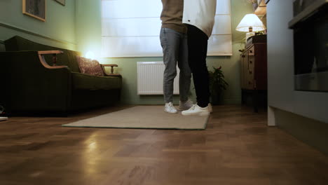 couple dancing at home