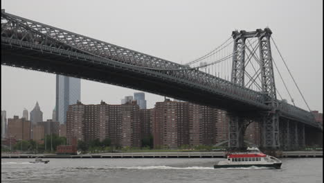 new york city bridge with ferry