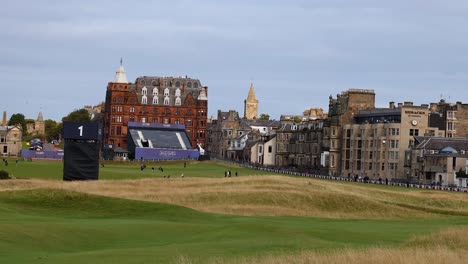 golf course with historic buildings in background