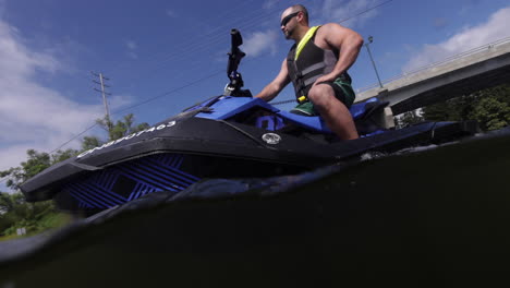 jet ski rider posing on a sunny day