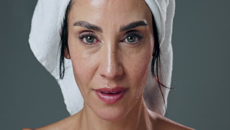 woman applying face wash
