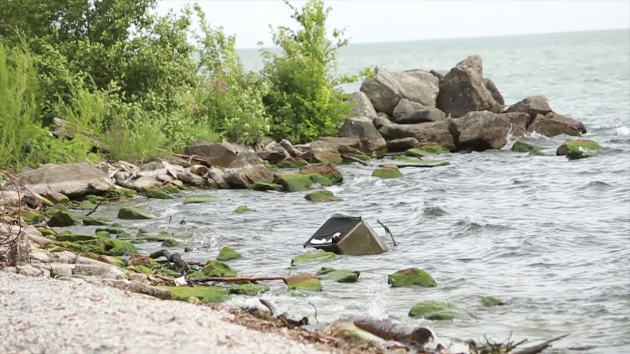 Garbage in water, lake ontario with decent waves.