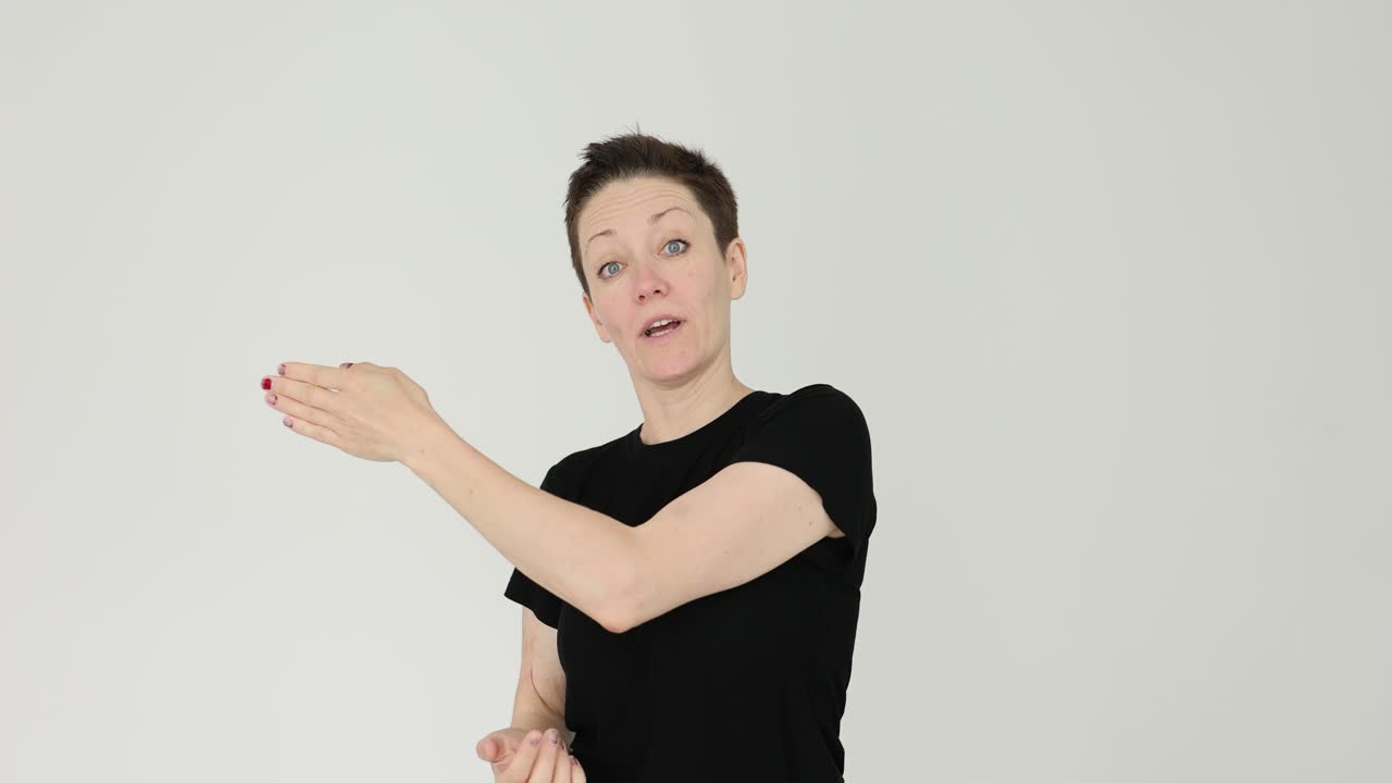 Woman Demonstrating Hand Gestures and Facial Expressions