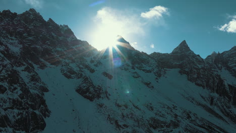 majestic mountain peaks under a golden sunrise