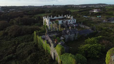 soldiers point house establishing aerial view over overgrown holyhead victorian hotel mansion turret