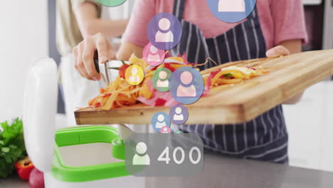 chopping vegetables, social media interaction animation over kitchen scene