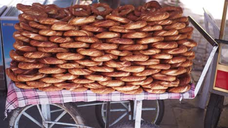 a stack of turkish bagels on a cart