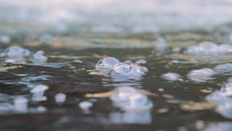 Colorful-water-surface-with-natural-bubbles-moving