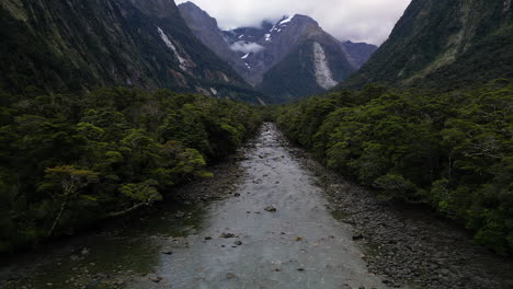 harrisons river and reveal of mount pembroke with visible tree avalanche, aerial view