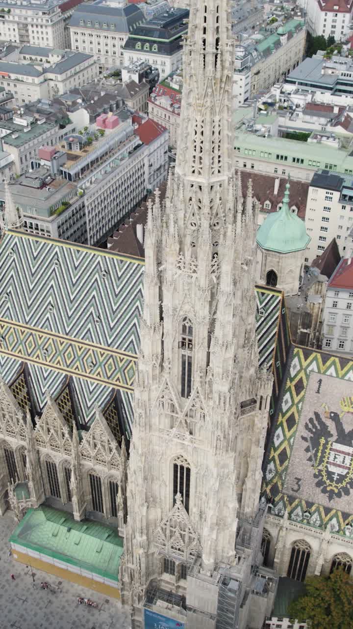 View of St. Stephen's Cathedral Roof And Stephansdom South Tower. Aerial, Vertical Video, Orbit Motion