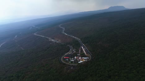 High-altitude-aerial-view-circling-the-dangerous-Pear-turn-at-the-Mexico-Cuernavaca-Highway