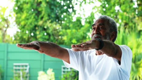 Senior-man-exercising-at-home