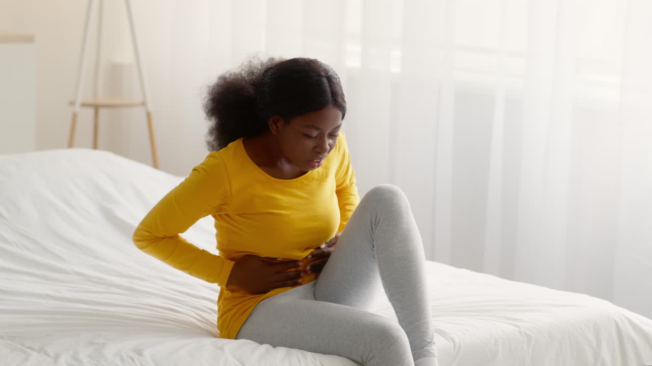 Woman Experiencing Stomach Pain