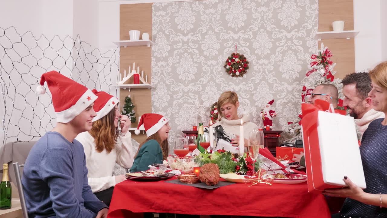 Family Christmas Celebration with Gifts and Dinner