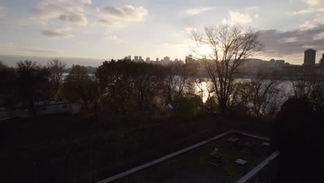 Slow-reveal-of-Montreal-city-in-the-distance-at-sunset